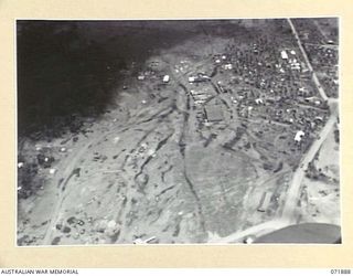 LAE, NEW GUINEA. 1944-03-30. THE CHARING CROSS AREA VIEWED FROM THE AIR
