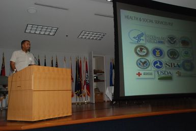 Hawaii, Aug. 23, 2012 -- Byron Mason, Health and Human Services, presenting Recovery Support Function information during the National Disaster Recovery Framework rollout in Hawaii