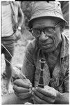 Master artist Sulafanamae of Tofu plaiting a comb