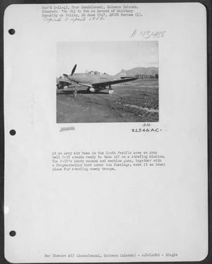 At An Army Air Base In The South Pacific Area An Army Bell P-39 Stands Ready To Take Off On A Strafing Mission. The P-39'S Heavy Cannon And Machine Guns, Together With A Fragmentation Bomb Under The Fuselage, Make It An Ideal Plane For Strafing Enemy Tro (U.S. Air Force Number 91546AC)