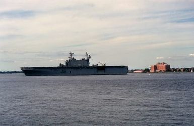 Port side view of the Amphibious Assault Ship USS SAIPAN (LHA 2) passing the historic Chamberlein Hotel on old Point Comfort. The SAIPAN is returning to her home port after putting to sea to avoid the effects of Hurricane Floyd as the storm moved up the east coast