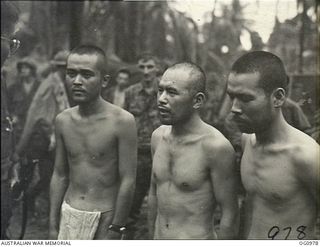 AITAPE AREA, NORTH EAST NEW GUINEA. C. 1944-04. GROUP PORTRAIT OF THREE NAKED AND SCANTILY CLOTHED JAPANESE PRISONERS OF WAR (POWS) WHO WERE TAKEN BY AMERICAN INVASION FORCES AFTER THEIR LANDING AT ..