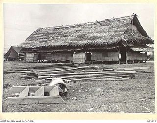 CAPE WOM, WEWAK AREA, NEW GUINEA, 1945-06-13. THE MESS HUT AND LIVING QUARTERS OF MAJ-GEN J.E.S. STEVENS, GOC 6 DIVISION AT HQ 6 DIVISION