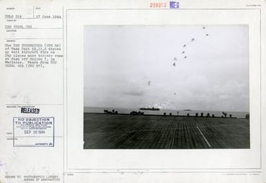 The USS Corregidor Throws Up Anti-Aircraft Fire as Japanese Planes Make Torpedo Runs at Dusk, off Saipan Island in Marianas