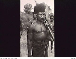 KAIAPIT, NEW GUINEA. 1943-09-26. "YARAWA" A NATIVE POLICE BOY WHO CAPTURED A JAPANESE SERGEANT SINGLE HANDED IN THE 21ST AUSTRALIAN INFANTRY BRIGADE AREA