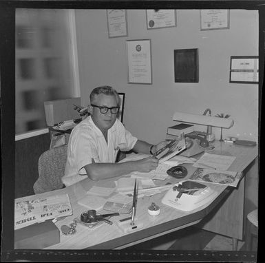 Unidentified man in office, Nadi Airport, Fiji