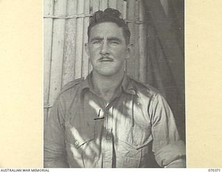 MILNE BAY, NEW GUINEA, 1944-01-11. NX149548 LANCE CORPORAL K.F. O'DONNELL, DETACHMENT Z FIELD SECURITY SECTION, ATTACHED TO THE MILNE BAY BASE SUB AREA