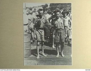 PORT MORESBY, NEW GUINEA. 1942-04-12. SERVICE PERSONNEL, WHO, WITH 155 OTHERS, INCLUDING CIVILIANS WHO WERE SUCCESSFULLY WITHDRAWN FROM PALMALMAL ON THE SOUTH COAST OF NEW BRITAIN PHOTOGRAPHED ON ..