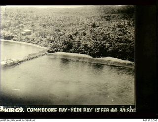 COMMODORE BAY, ?NEW BRITAIN. 1944-02-15. AERIAL PHOTOGRAPH OF A SMALL JETTY CAMOUFLAGED BY THE JAPANESE TO CONCEAL MILITARY ACTIVITY. IT WAS A TYPICAL TARGET ENCOUNTERED BY BEAUFIGHTER AIRCRAFT OF ..