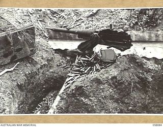 KAKAKOG AREA, NEW GUINEA, 1943-10-02. A JAPANESE 13 MM GUN CAPTURED BY AUSTRALIAN TROOPS