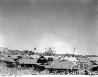 JAPANESE ARMY TYPE 2 'KA MI' AMPHIBIOUS LIGHT TANKS PARKED ON THE GAZELLE PENINSULA. (RNZAF OFFICIAL PHOTOGRAPH.)