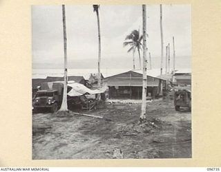 MOEM, WEWAK AREA, NEW GUINEA, 1945-09-17. THE KITCHEN AREA IN THE CAMP SITE OF 2/4 ARMOURED REGIMENT DETACHMENT WITH 4 INFANTRY TROOPS WORKSHOP