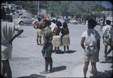 Some of Moresby's people, some vehicles are circulating : Port Moresby, Papua New Guinea, 1953 / Terence and Margaret Spencer