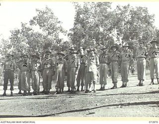 Port Moresby, New Guinea. 4 May 1944. Officers in G Branch area, Headquarters New Guinea Force at the conclusion of the Commander's Conference. Identified personnel are: NX191921 Lieutenant K. J. ..