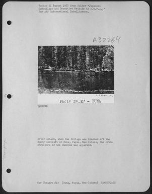 After attack, when the foliage was blasted off the dummy aircraft at Buna, Papua, New Guinea, the crude structure of the dummies was apparent. (U.S. Air Force Number A24869AC)