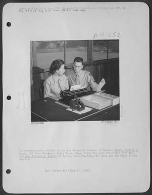 In Administrative Offices Of The Air Transport Command In Hawaii, S/Sgt. Charles S. Moore, 805 West Broadway, Eagle Grove, Iowa, Turns His Desk And Duties Over To Wac Cpl. Mildred W. Runyon Of Holden, West Virginia. The Wacs Are The First In The Pacific. (U.S. Air Force Number A59361AC)