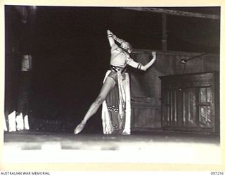 WEWAK POINT, NEW GUINEA. 1945-09-28. A BIBLICAL DANCE BY DARYA COLLIN FOR TROOPS ATTENDING A PERFORMANCE BY THE DARYA COLLIN BALLET TROUPE AT HEADQUARTERS 6 DIVISION. THE PERFORMANCE WAS MADE ..