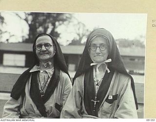 TOROKINA, BOUGAINVILLE. 1945-04-28. Sister Ludovica (left) and Sister Lidwina (right), Missionary Sisisters of the Society of Mary, who are receiving treatment at 2/1 general hospital, following ..