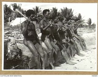 MIRAVASI, NEW GUINEA, 1943-09-07. SOME OF THE NATIVE BOYS EMPLOYED BY THE 2/4TH AUSTRALIAN FIELD SQUADRON, ROYAL AUSTRALIAN ENGINEERS, ON THE CONSTRUCTION OF THE GROYNE
