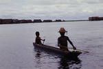 Small boys canoeing near Kambaram village, Middle Sepik area, [Papua New Guinea, 1969?]