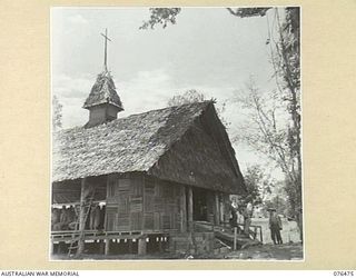 LAE, NEW GUINEA. 1944-09-29. SERVICE PERSONNEL MOVING INTO THE NEW CHAPEL AT HEADQUARTERS NEW GUINEA FORCE FOR THE CONSECRATION CEREMONY TO BE CONDUCTED BY VX13 LIEUTENANT-GENERAL S.G. SAVIGE, CB, ..