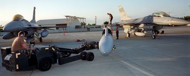 Maintenance crews remove the fuel pods from F-16C Fighting Falcon aircrafts who are from the South Carolina Air National Guard (SCANG). The SCANG is deployed to Hickam Air Force Base, Hawaii for Sentry Aloha. This exercise is an opportunity for the Hawaii Air National Guard, based on Hickam, to train with F-16 units based on the U.S. mainland. The SCANG is based on McEntire AIR National Guard Station, Eastover, South Carolina