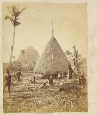 Kanak men in front of a native dwelling known as a grande case, La Foa district [?] New Caledonia, ca. 1870s / Allan Hughan