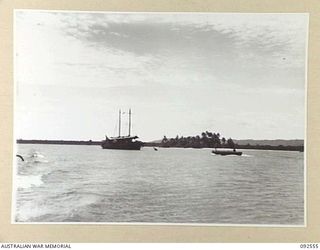 BOUGAINVILLE. 1945-05-25. THE HOSPITAL SHIP STRADBROKE, WHICH EVACUATES WOUNDED TO 2/1 GENERAL HOSPITAL, TOROKINA, LYING AT ANCHOR OFF SAPOSA ISLAND WITH SIKIKO ISLAND IN THE BACKGROUND