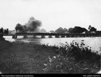 Cane train crossing Rarawai railway bridge