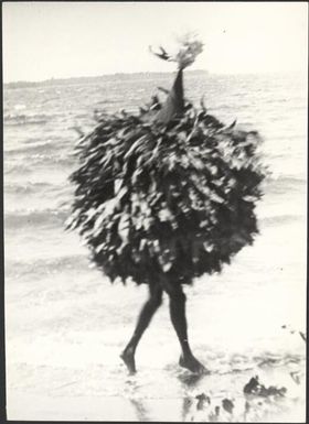 Dukduk stepping ashore, Rabaul Harbour, New Guinea, 1929 / Sarah Chinnery