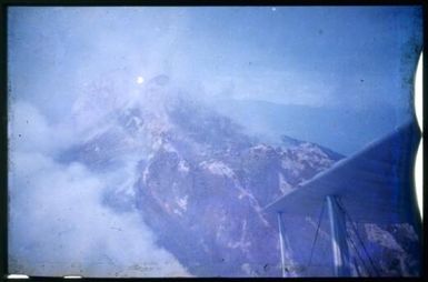 Mt. Lamington from Tony Taylor's plane monitoring flight on a morning I accompanied him, [1951], 2 / Albert Speer