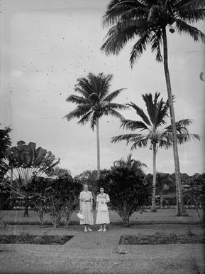 [Portrait of two women in Pacific Island park]