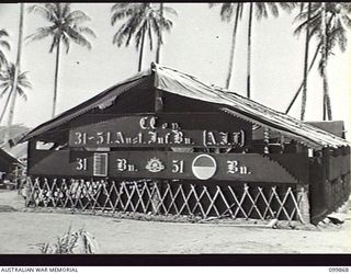 RABAUL, NEW BRITAIN, 1946-03-01. THE UNIT SIGN AT THE ENTRANCE TO THE CAMP AREA OF C COMPANY, 31/51ST INFANTRY BATTALION