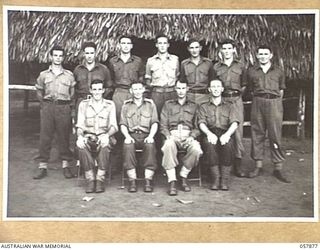 DOBODURA, NEW GUINEA, 1943-10-11. GROUP PORTRAIT OF MEMBERS OF THE HEADQUARTERS SIGNALS, 11TH AUSTRALIAN DIVISION