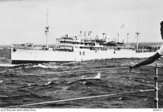 PACIFIC OCEAN. 1940-06-07. THE ITALIAN LINER ROMOLO, WHICH HAD FLED FROM BRISBANE A FEW DAYS BEFORE WAR WITH ITALY BROKE OUT, BEING CLOSELY SHADOWED BY THE ARMED MERCHANT CRUISER HMAS MANOORA. ..