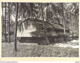 JACQUINOT BAY, NEW BRITAIN. 1945-06-09. THE TYPE OF HUT USED FOR AMMUNITION STORAGE AT HEADQUARTERS 5 BASE SUB-AREA