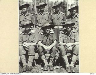 SIAR, NEW GUINEA. 1944-06-23. OFFICERS OF HEADQUARTERS COMPANY, 57/60TH INFANTRY BATTALION. IDENTIFIED PERSONNEL ARE:- VX81070 CAPTAIN N.M. MCALLISTER (1); LIEUTENANT N.W. GOODE (2); VX81071 ..