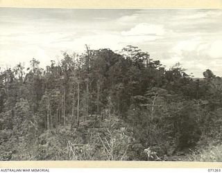 FINSCHHAFEN AREA, NEW GUINEA. 1944-03-18. PEAK HILL VIEWED FROM WAREO