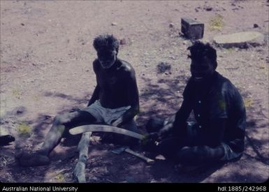 Aboriginal men seated on the ground