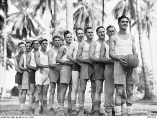 Members of a soccer team from Headquarters, 5th Division who are to play a team from the 35th Infantry Battalion. Identified personnel are: (left to right) QX36379 Driver G H Sims (back of line); ..