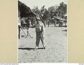 9TH AUSTRALIAN DIVISION, UNDER THE COMMAND OF NX7 MAJOR-GENERAL G.F. WOOTTEN, CBE, DSO, ED, IN THE FIRST AUSTRALIAN AMPHIBIOUS OPERATION SINCE GALLIPOLI, LANDS AT LAE. ADMIRAL BARBEY, COMMANDING ..