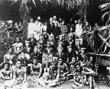 Robert Louis Stevenson with family, friends, and the band of HMS Tauranga, at Vailima, Samoa