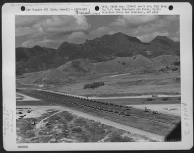Aerial View Of Inspection Of Republic P-47 'Thunderbolts' Of The 318Th Fighter Group, Prior To Move To Saipan, Marianas Islands. 15 May 1944. Bellows Field, Oahu, Hawaii. (U.S. Air Force Number A63568AC)