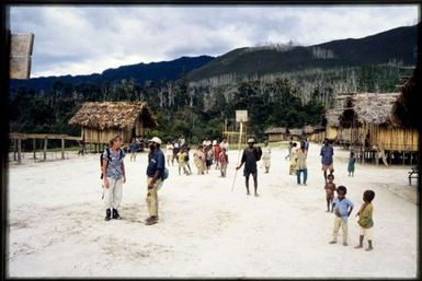 Viv Whitaker with locals in village