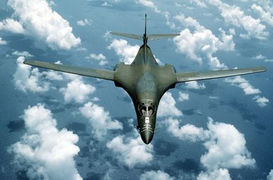 A B-1B aircraft passes over the ocean while on a flight out of Anderson Air Force Base, Guam, during Exercise Giant Warrior '89