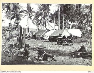 RIFE AREA, NEW BRITAIN. 1945-03-06. THE MEDIUM MACHINE GUN SECTION OF HEADQUARTERS COMPANY, 14/32ND INFANTRY BATTALION, THE MOST FORWARD SECTION IN THE AREA, IN THEIR MACHINE GUN EMPLACEMENTS