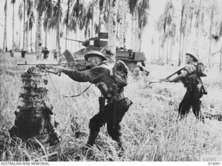 1943-01-02. PAPUA, GIROPA POINT. AUSTRALIAN MANNED M3 GENERAL STUART TANKS ATTACKING JAPANESE PILLBOXES IN THE FINAL ASSAULT ON BUNA. MEN OF D COMPANY, 2/12TH BATTALION, FIRE ON 25 JAPANESE (NOT ..