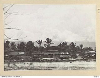 JACQUINOT BAY, NEW BRITAIN. 1945-06-11. THE GENERAL AREA OF "COOGEE BEACH", 5 BASE SUB-AREA, WHERE THE CORPS OF AUSTRALIAN ELECTRICAL AND MECHANICAL ENGINEERS WATERCRAFT, WORKSHOPS ARE SITUATED