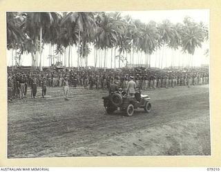 AITAPE, NEW GUINEA. 1945-02-23. VGX17 MAJOR- GENERAL J.E.S. STEVENS, DSO, ED, GENEFAL OFFICER COMMANDING 6TH DIVISION, INSPECTING THE 2/4TH INFANTRY BATTALION DURING HIS VISIT TO THE 19TH INFANTRY ..