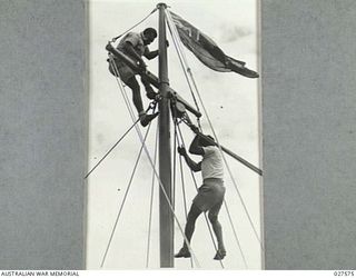 CLIFTON GARDENS, SYDNEY, AUSTRALIA. 1942-12. NATIVES FROM THE PACIFIC ISLANDS SERVING WITH 1 AUSTRALIAN WATER TRANSPORT GROUP PRACTICE SCALING THE RIGGING